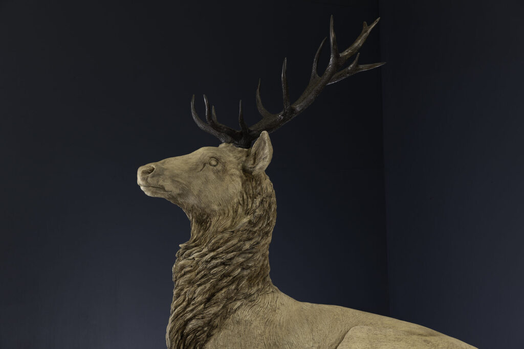 Reclining Stag garden Statue in stone detail of antlers
