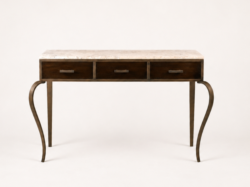 Dark wood desk with a light marble top, three central drawers, and curved metal legs for an elegant vintage look.