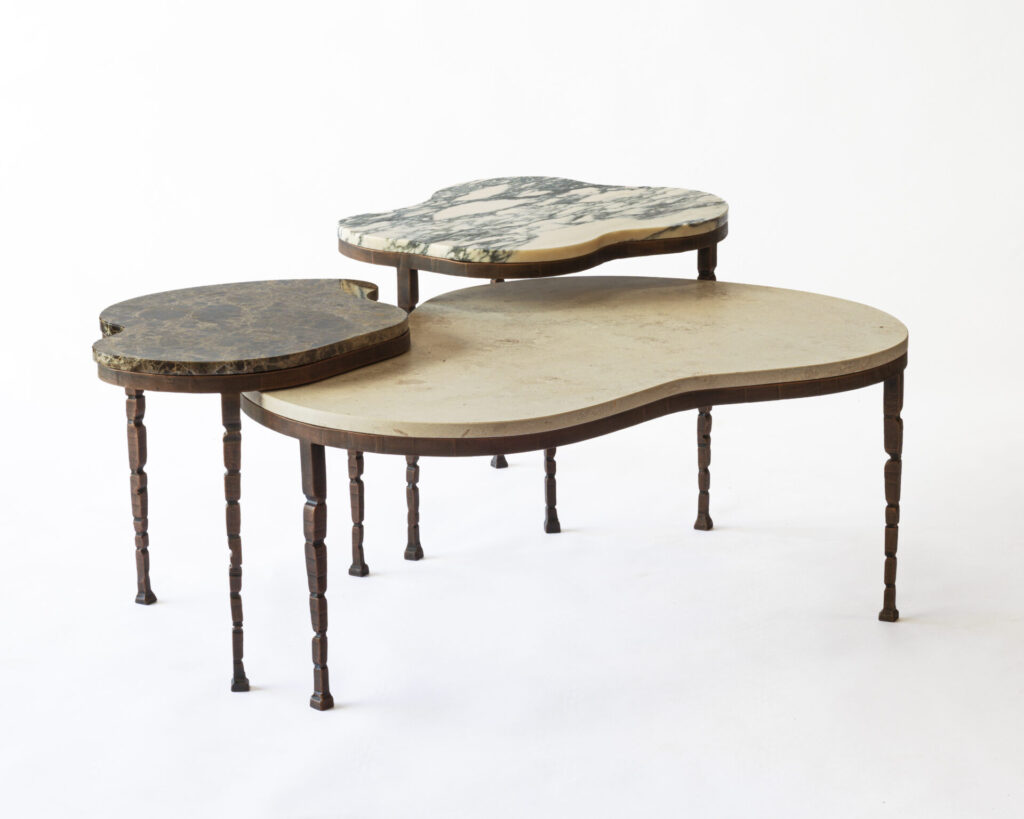 Ashbourne Coffee Nest Tables with wood legs and your choice of stone tops. Comes as a set of three.