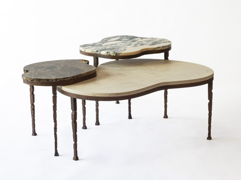 Ashbourne Coffee Nest Tables with wood legs and your choice of stone tops. Comes as a set of three.